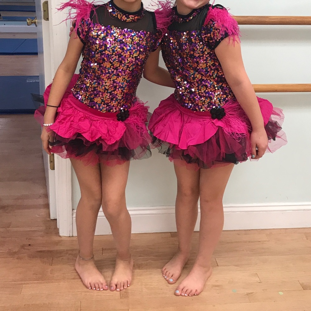 Colorful sequin and pink feather costume
